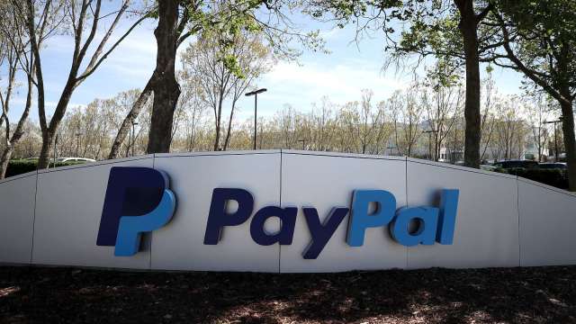 PayPal下修營業利潤預期 股價挫近13% 華爾街反而樂觀喊買 (圖片:AFP)