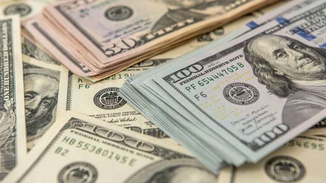 經濟數據強韌 美元續揚 在岸人民幣貶至16年新低 (圖:Shutterstock)