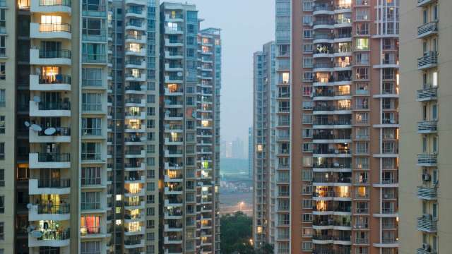 中國住建部部長倪虹說，建商該破產的破產，該重整的重整。（圖：Shutterstock）