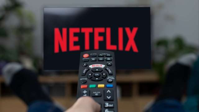 Netflix股價飆漲三年來首創新高(圖：Shutterstock)