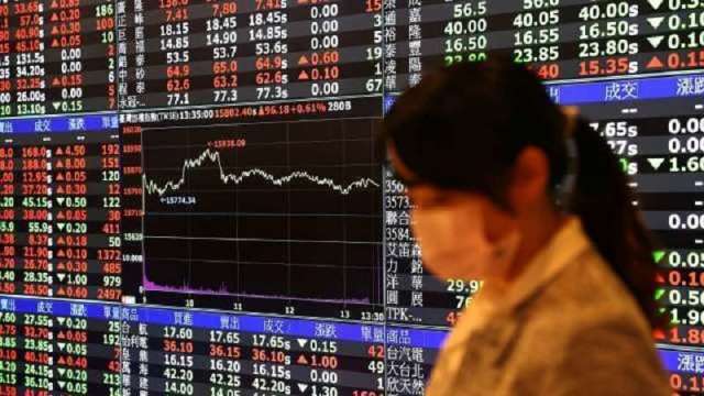 台股漲 452.87 點收 21782.87 點 三大法人買超 618.45 億元(圖:REUTERS/TPG)