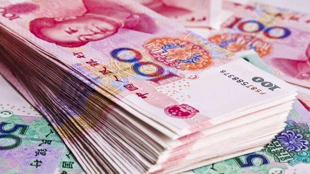 離岸人民幣兌美元升破7.10關口。（圖：Shutterstock）