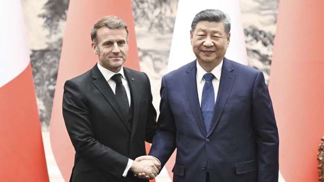 中國領導人周四在北京人民大會堂同法國總統馬克宏舉行會談。(圖:新華社)