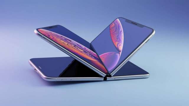 蘋果首款摺疊iPhone細節曝!「寬摺疊」設計、側邊Touch ID與雙4800萬畫素後鏡頭。(圖:Shutterstock)