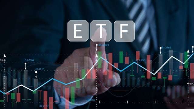 台股市值躍升全球第六 這8檔主動式ETF重壓千金股賺翻了。(圖:shutterstock)